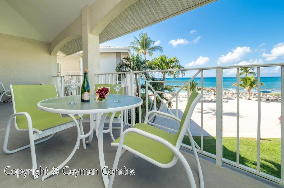 Spacious Porches overlooking beach at sunset cove